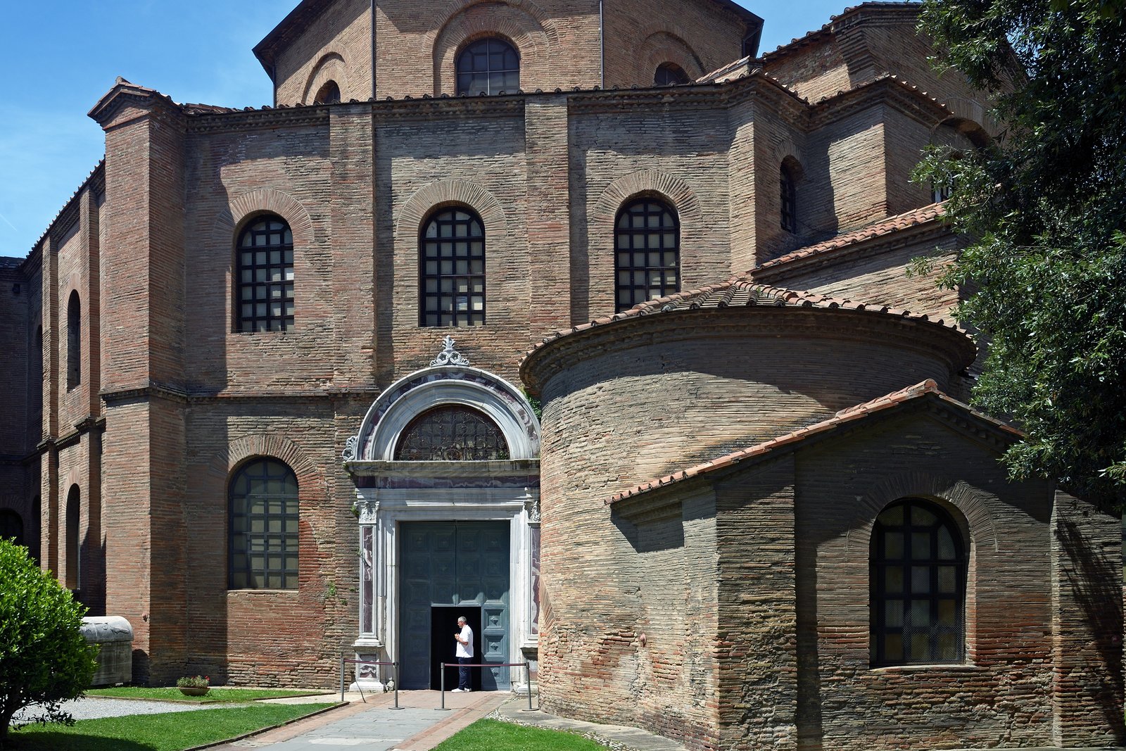The octagonal exterior brick walls and apse of the Basilica of San Vitale in Ravenna, Italy