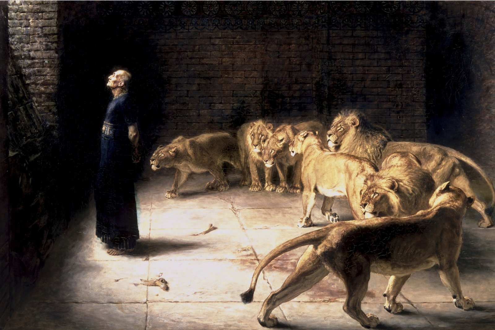 Daniel kneeling calmly among lions in the den, painted by Briton Riviere