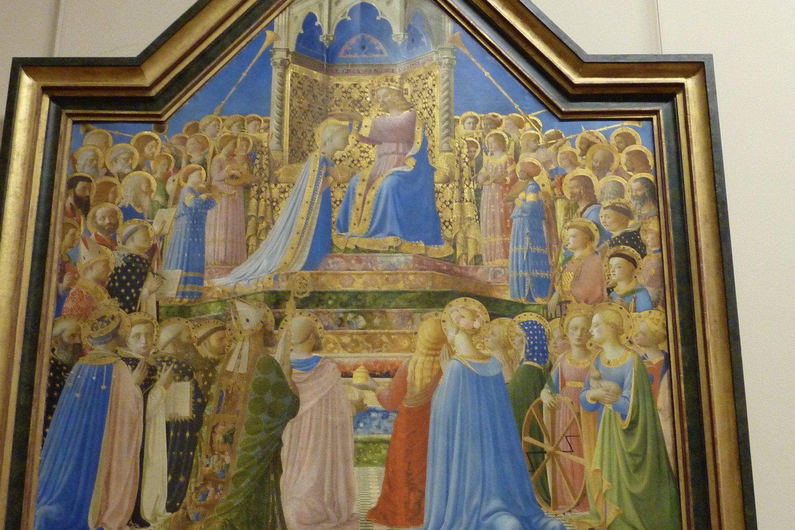 Fra Angelico's painting of the Coronation of the Virgin Mary in heaven, surrounded by saints and angels.