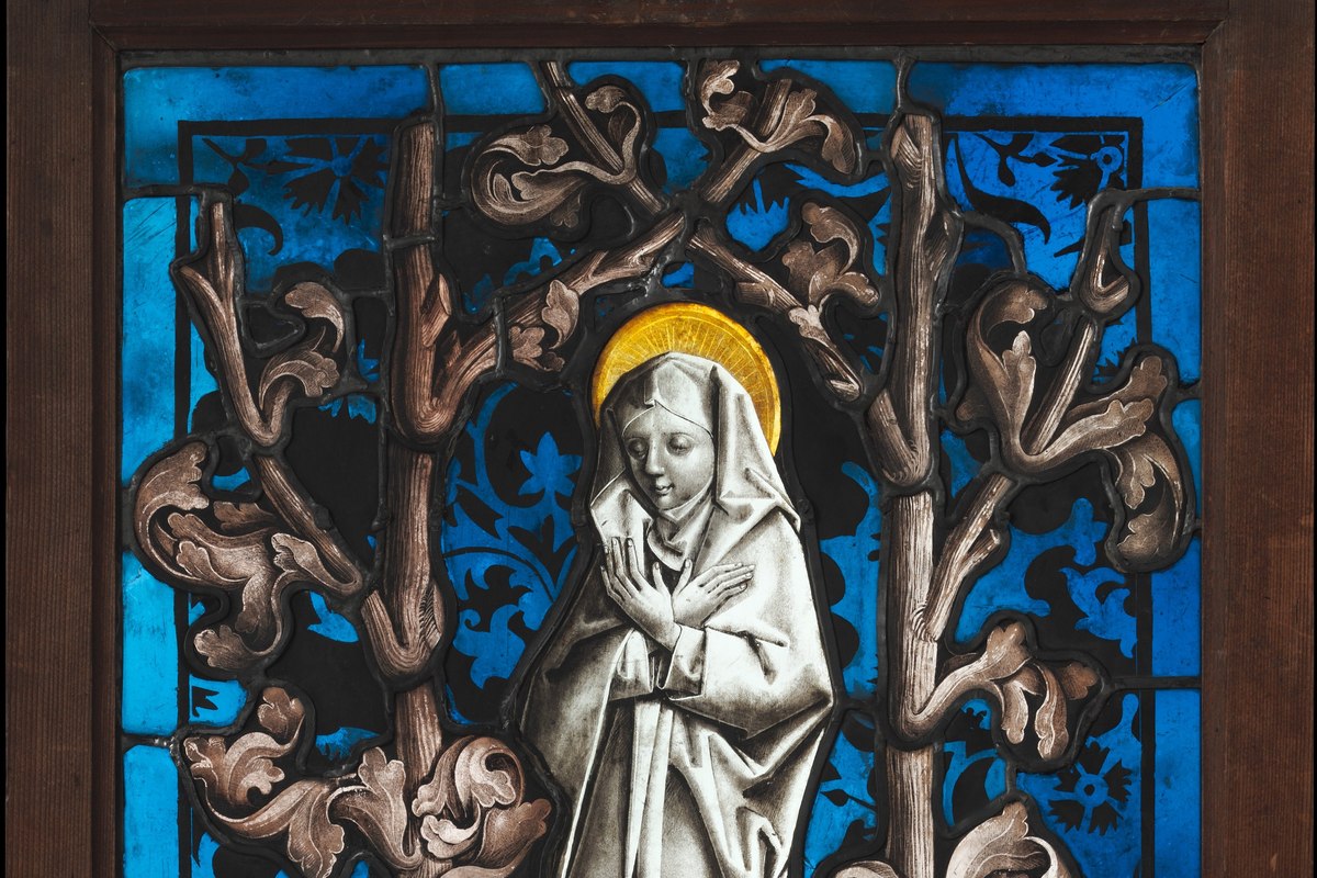 A devotional depiction of the Virgin Mary in mourning robes, her heart pierced by seven swords, eyes cast upward in grief.