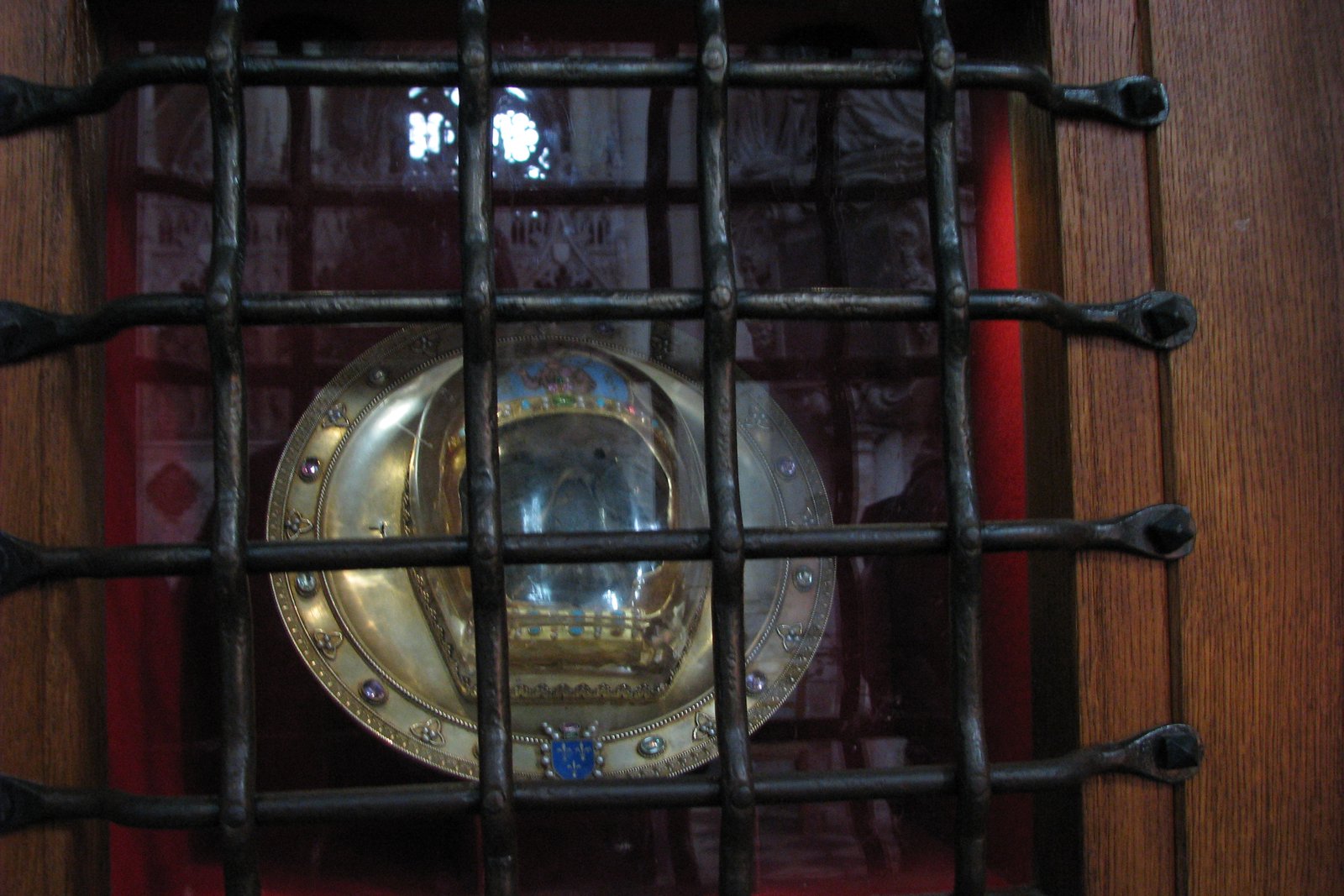 The facial relic of Saint John the Baptist displayed at Amiens Cathedral, France, set behind glass in an ornate reliquary case
