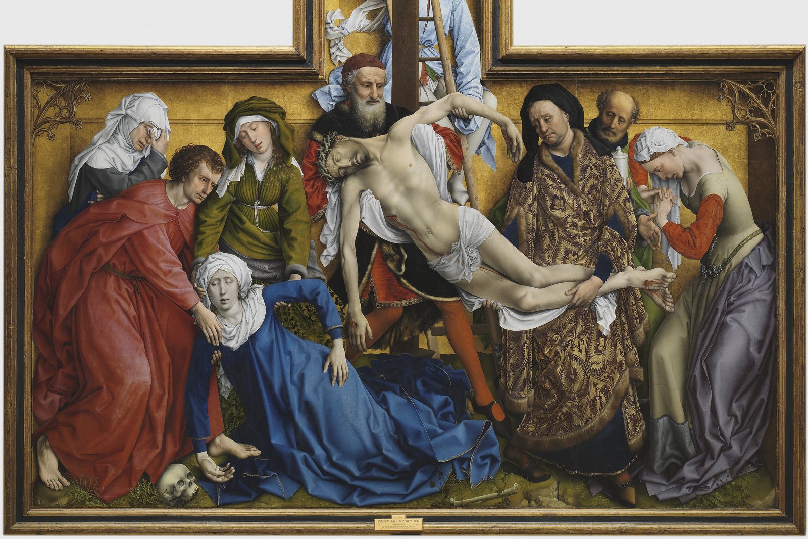 Rogier van der Weyden's Descent from the Cross, showing ten mourning figures crowded around the body of Christ in a shallow gilded space.
