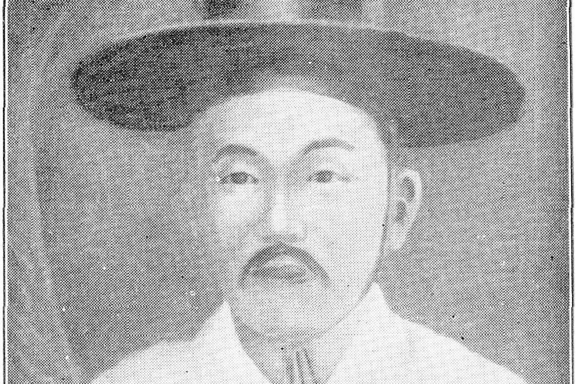 Period portrait of Saint Andrew Kim Taegon wearing a traditional Korean gat hat and hanbok, holding a book