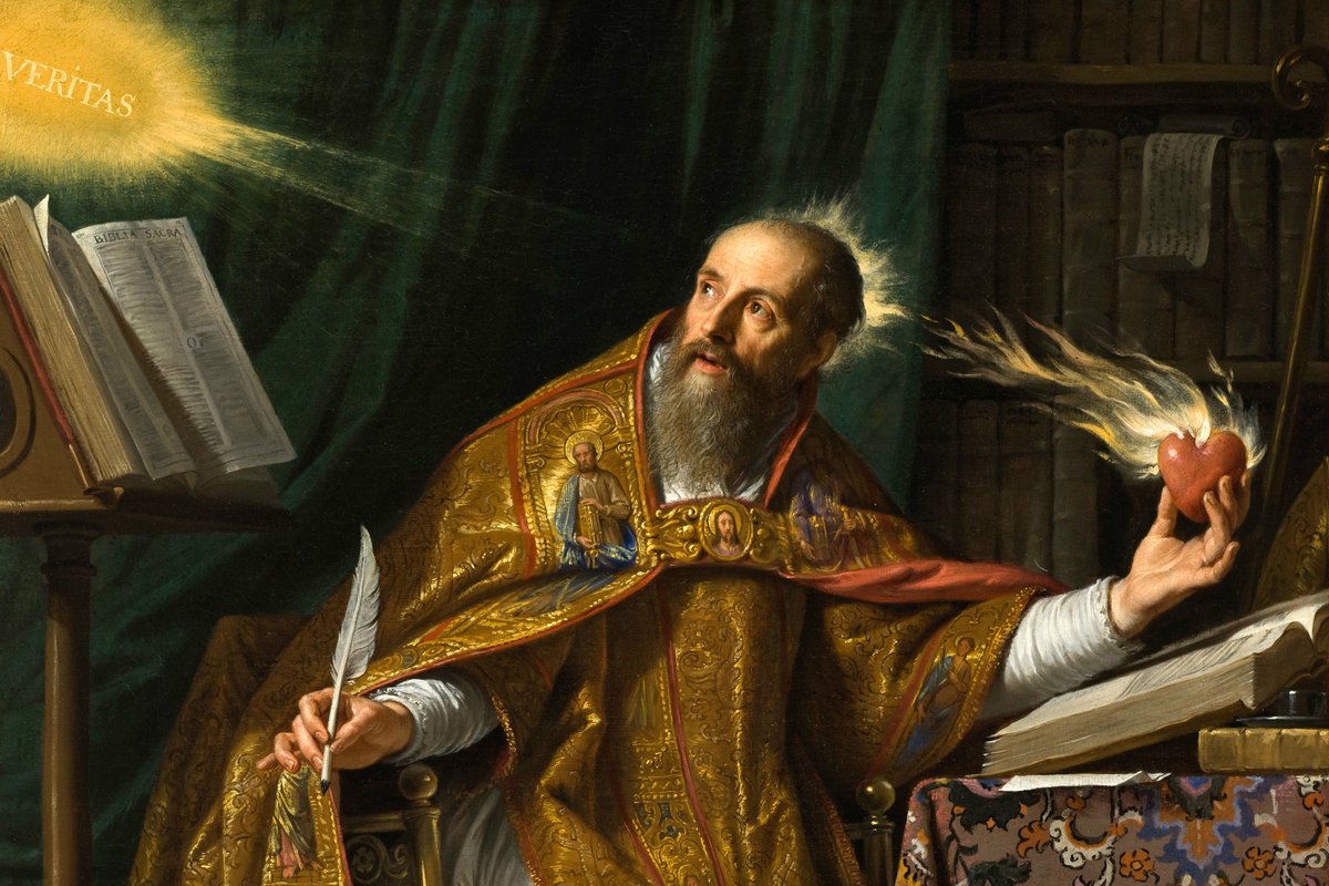 A bearded bishop in gold vestments gazes upward in his study, holding a quill in one hand and a burning heart in the other, beneath a glowing halo inscribed VERITAS.