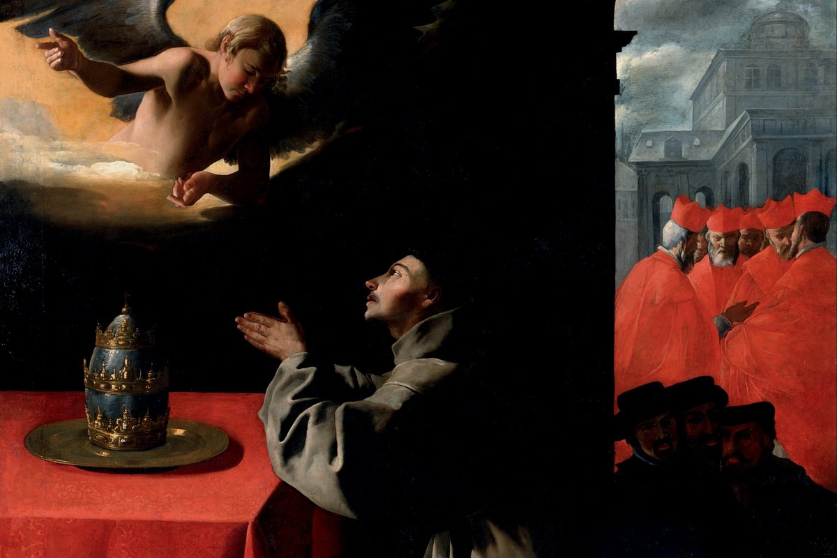 A Franciscan friar kneels in prayer beside a table bearing a jeweled papal tiara, gazing up at a hovering angel, while red-robed cardinals confer in the background.