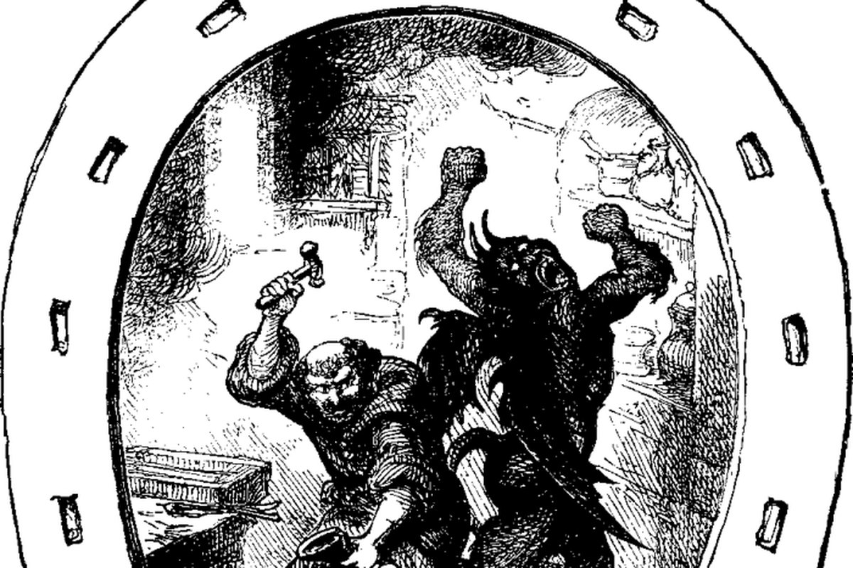 A 19th-century engraving of a blacksmith gripping the Devil's face with a pair of tongs inside a forge, framed within a giant horseshoe.