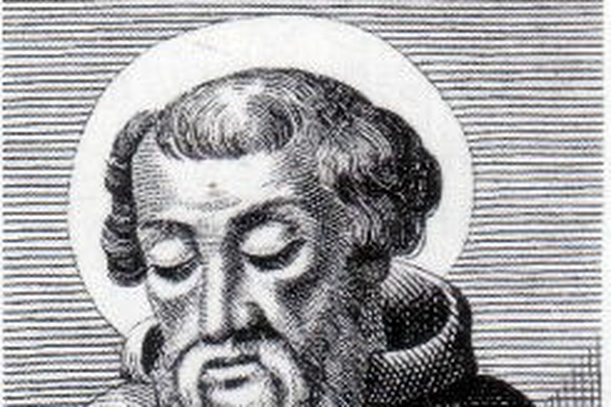 Un grabado en blanco y negro de un anciano obispo santo, barbudo y aureolado, con la cabeza inclinada, bajo una capucha monástica.