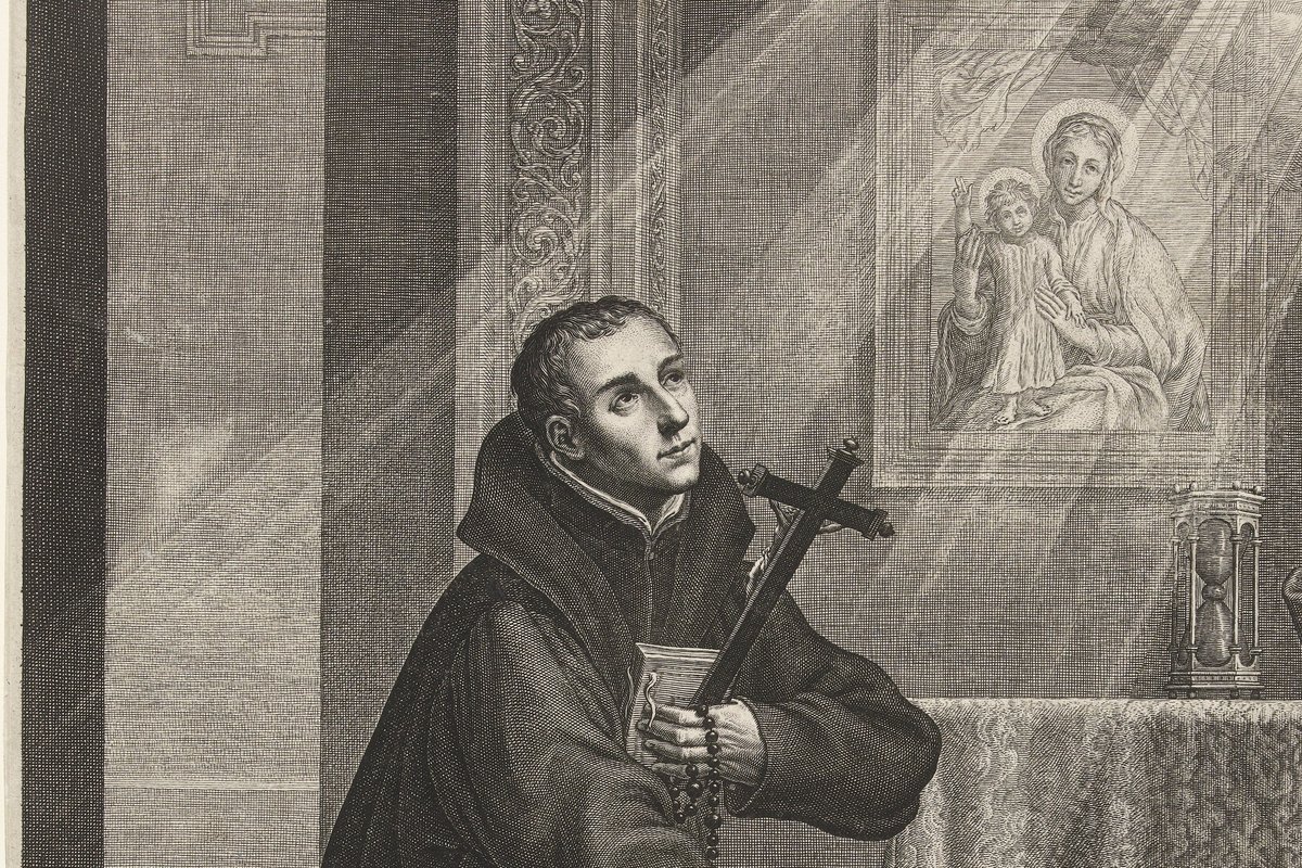A young Jesuit scholastic kneels in prayer holding a crucifix, rosary, and prayer book, gazing up toward a picture of the Madonna and Child, in a 17th-century engraving.