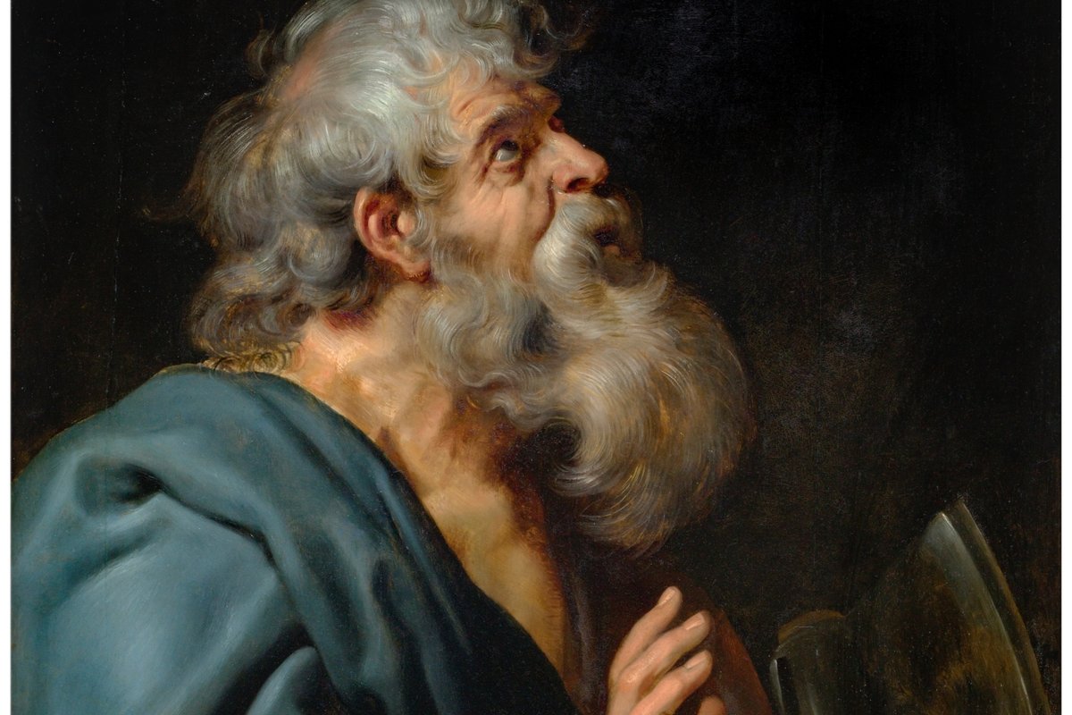 An elderly bearded apostle in a blue robe gazes upward with one hand raised, gripping the long-handled axe traditionally associated with his martyrdom.