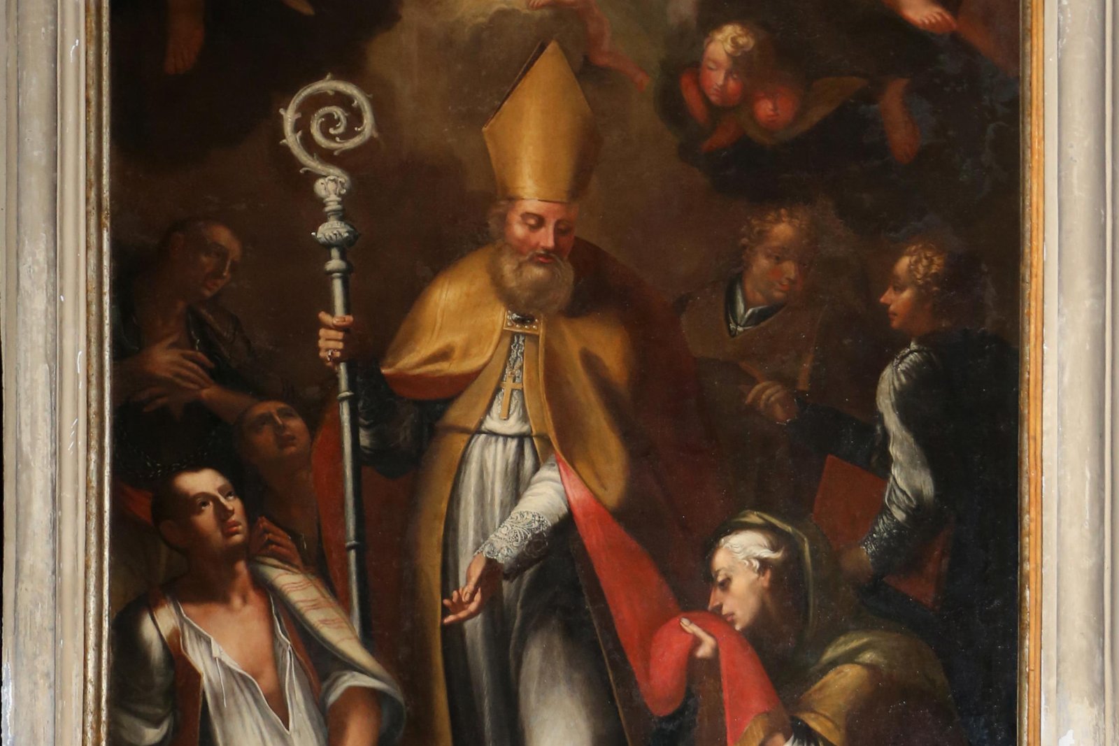 Baroque painting of Bishop Saint Paulinus of Nola holding his crosier, surrounded by clothed onlookers