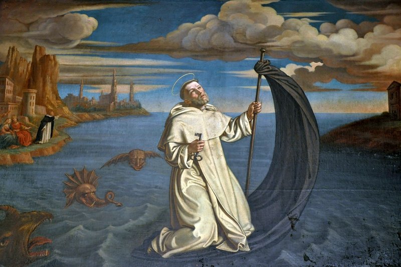 Baroque painting of Saint Raymond of Penyafort kneeling on his cloak as it sails across the sea, haloed, holding a book and keys