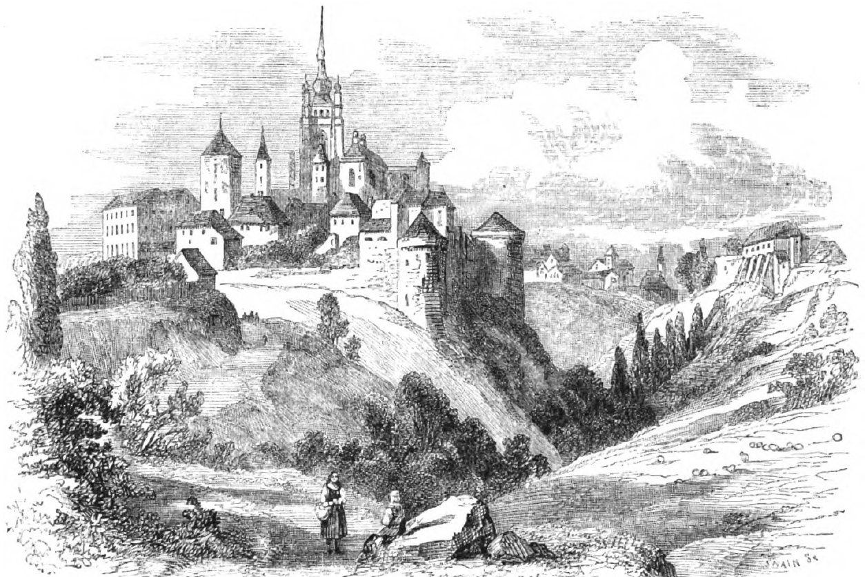 A mid-19th-century engraving of St. Vitus Cathedral rising above Prague Castle, shown still unfinished with its truncated west end