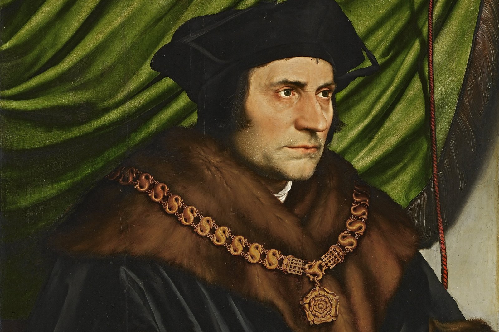 A Renaissance portrait of Saint Thomas More, wearing a black cap and a fur-trimmed robe with a gold chain of office, gazing to the side.