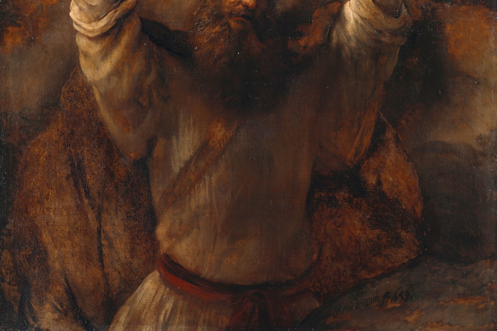 Rembrandt's painting of Moses holding up the tablets of the Ten Commandments.