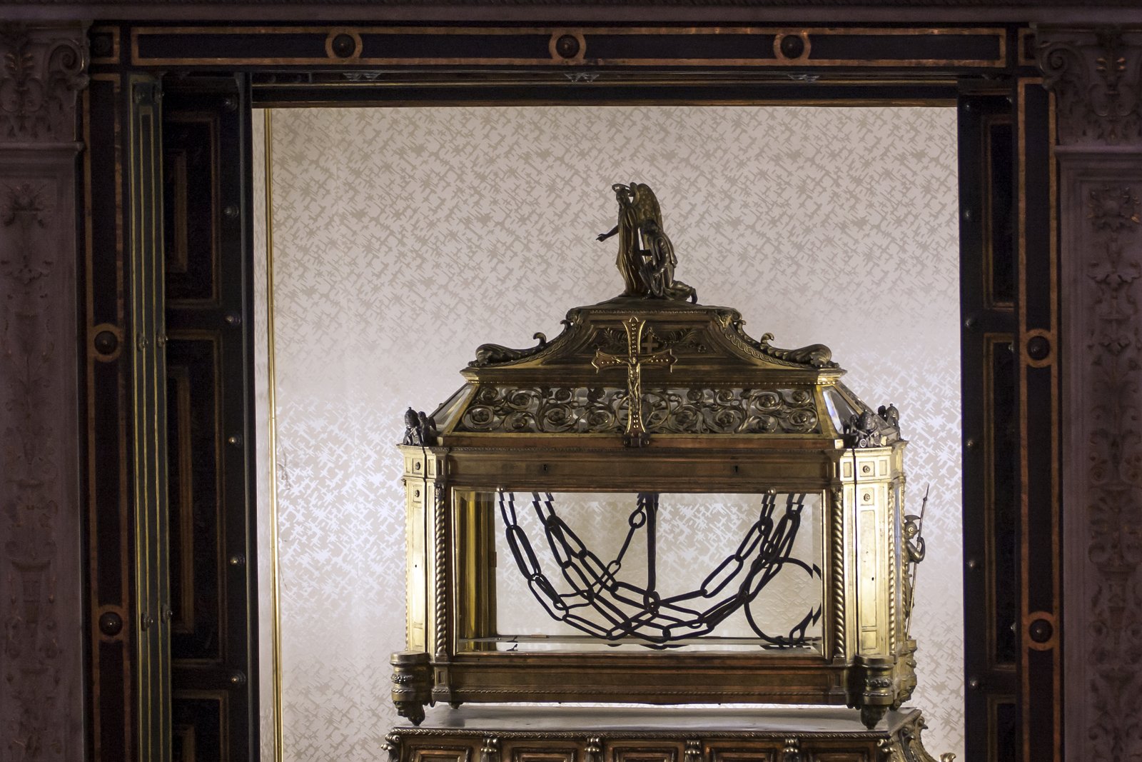 The chains venerated as the relic of Saint Peter's imprisonment, displayed in a glass reliquary case