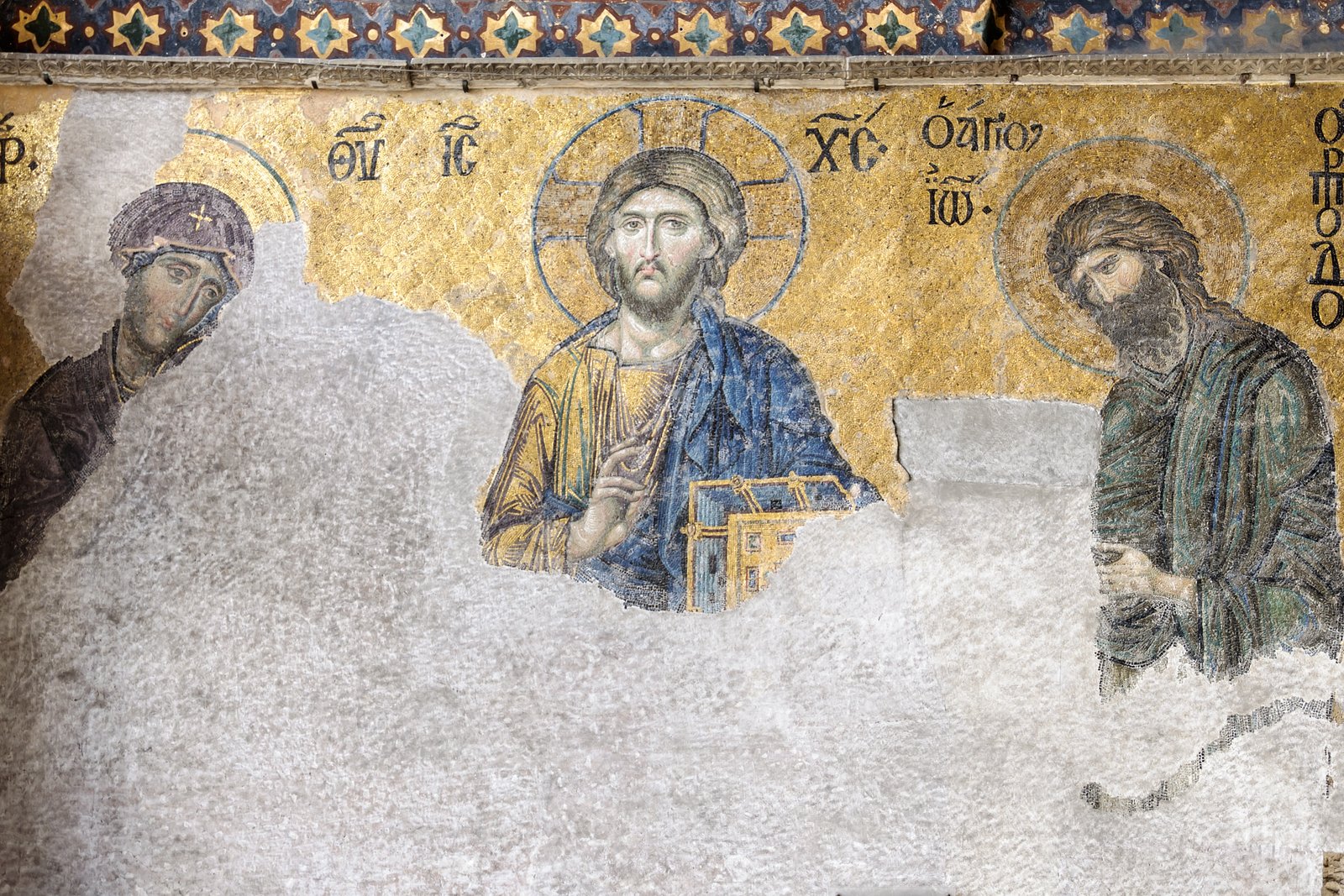 The Deesis mosaic in Hagia Sophia, showing Christ Pantocrator flanked by the Virgin Mary and John the Baptist, rendered in gold and colored glass tesserae.