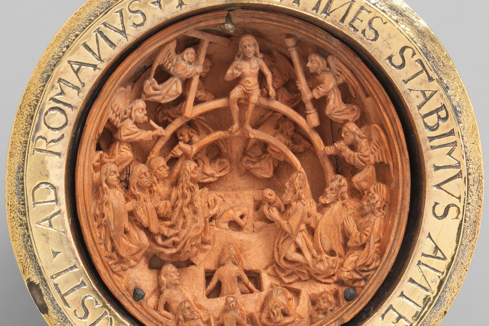 An early 16th-century carved boxwood rosary bead from Flanders, intricately detailed, now held at the Metropolitan Museum of Art