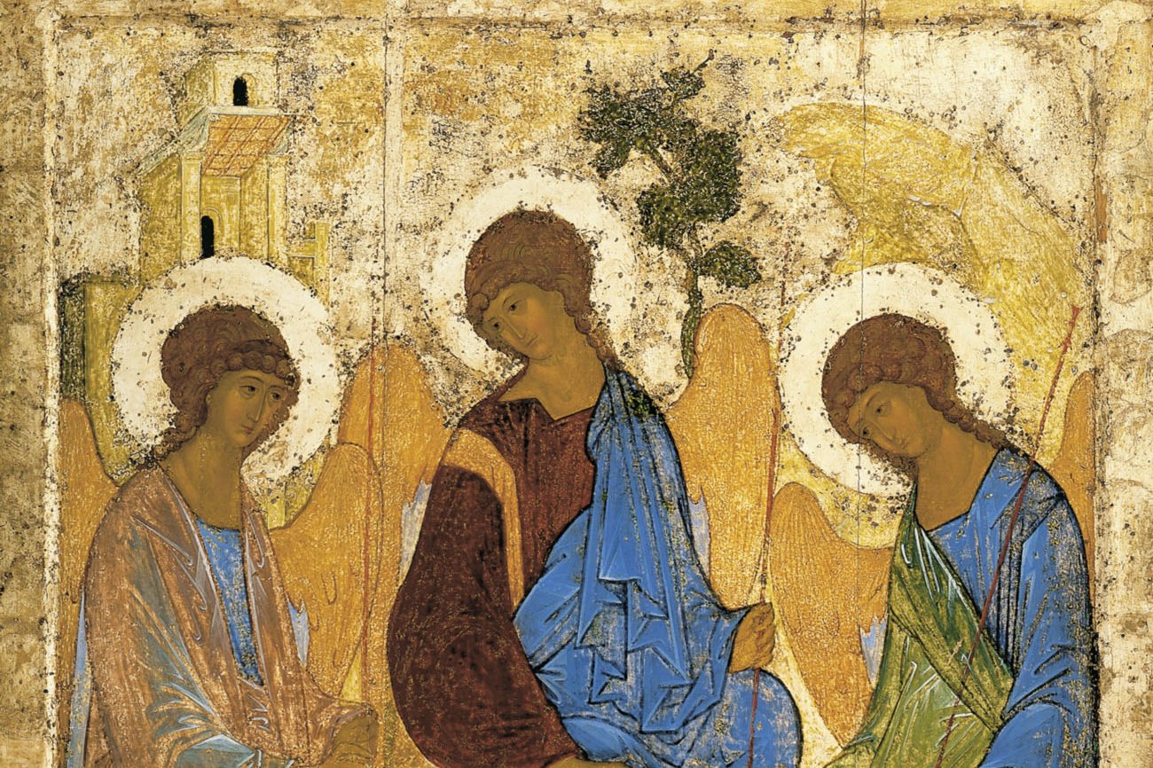 Andrei Rublev's icon of the Holy Trinity, showing three haloed angelic figures seated around a table, a classic Eastern Christian depiction of the Trinity.