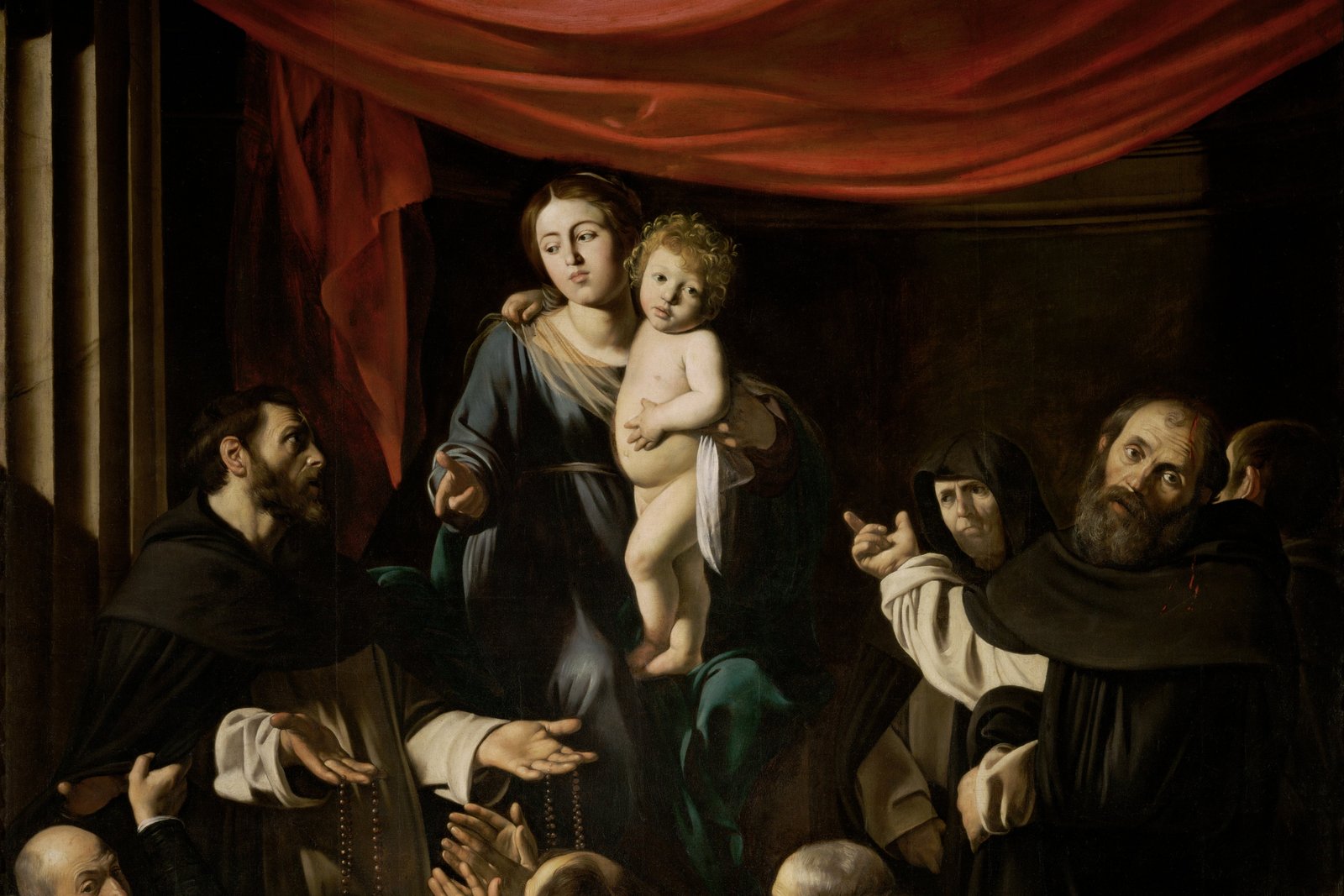 Caravaggio's Madonna of the Rosary, showing the Virgin Mary presenting the rosary to the faithful