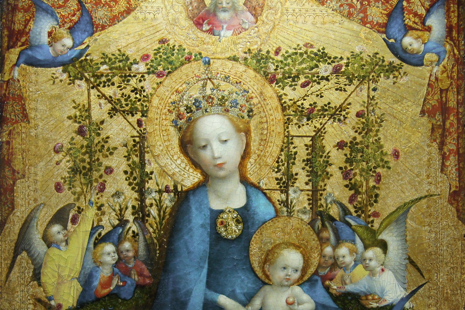 A gold-ground painting of the Virgin Mary crowned and enthroned with the Christ Child, seated within an enclosed garden bower covered in red and white roses.