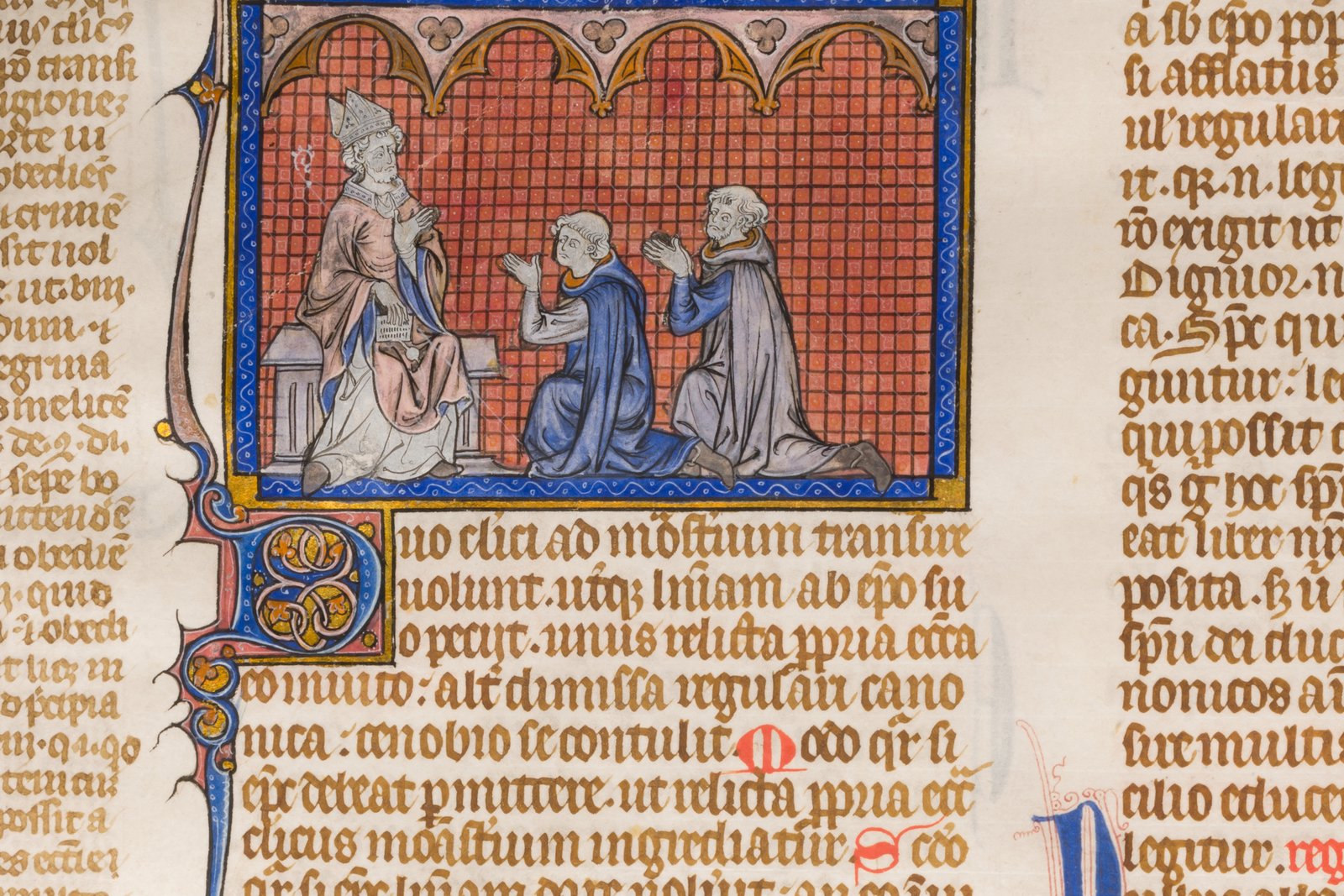 An illuminated 13th-century manuscript leaf from a copy of Gratian's Decretum, showing an ornate initial letter and columns of Latin legal text.