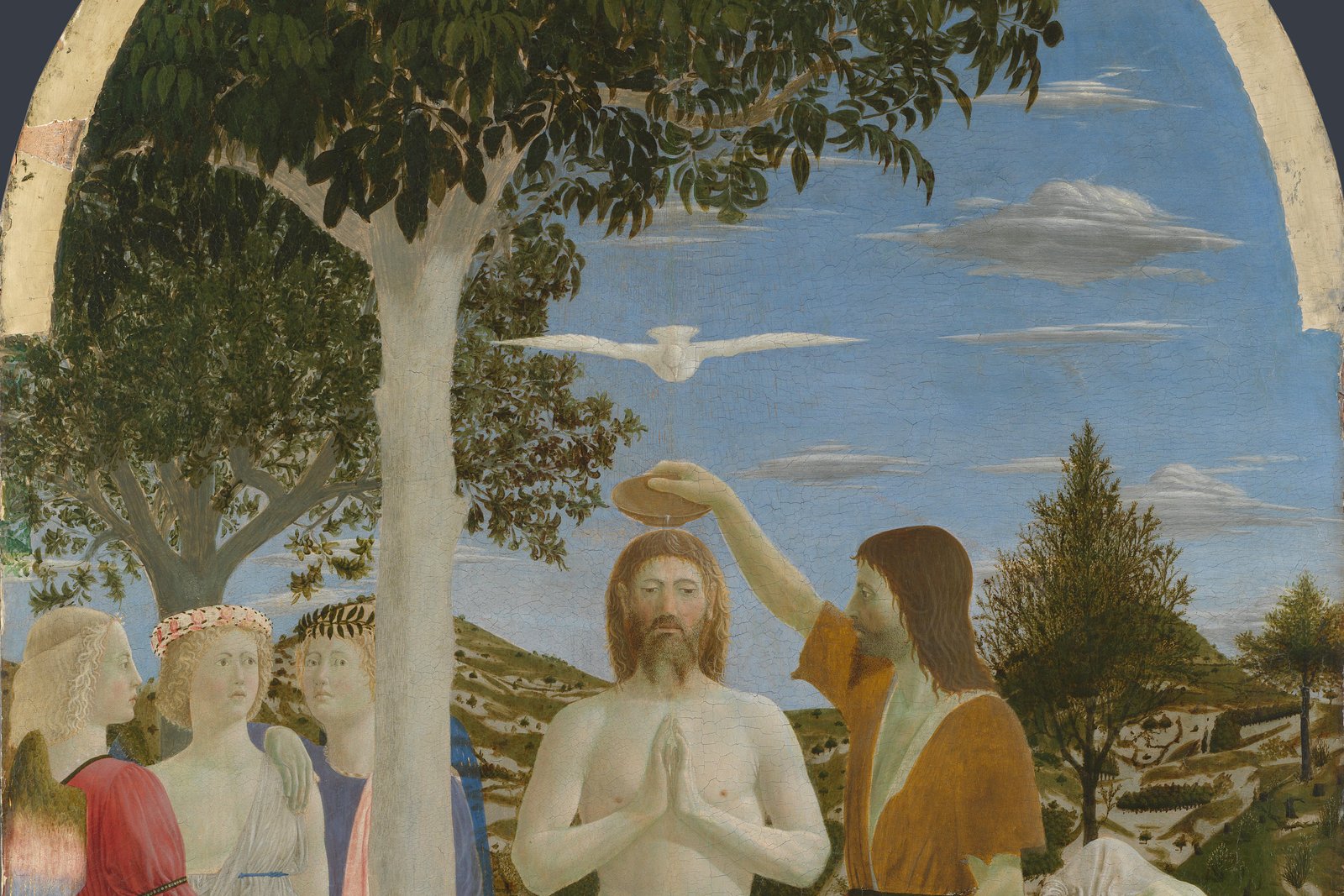 Piero della Francesca's Renaissance painting of the Baptism of Christ, showing Christ standing in the River Jordan as water is poured over his head.